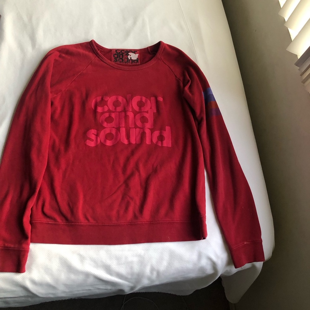 A crew neck sweater